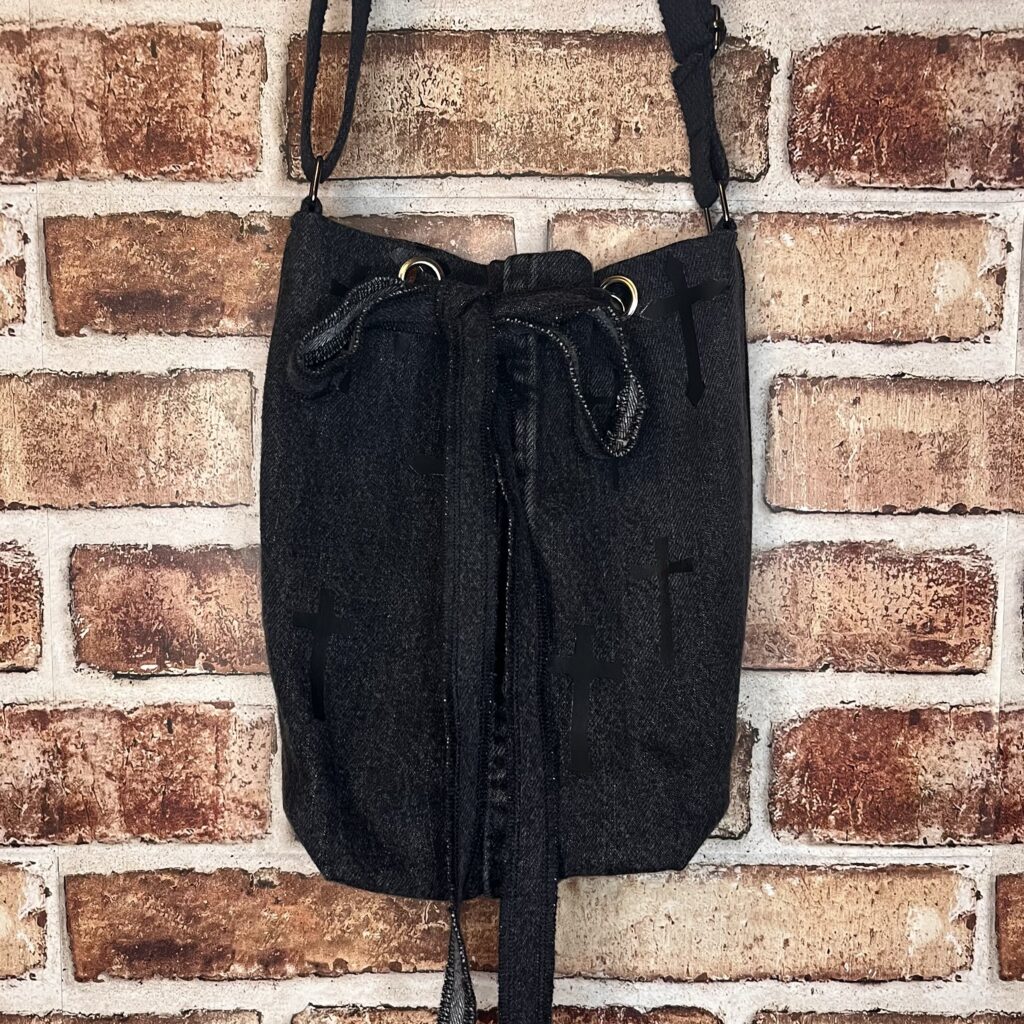Black bucket bag with vinyl cross design